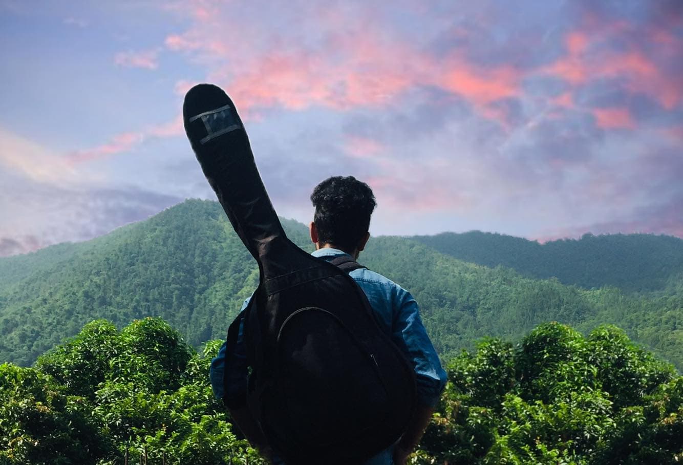 Ayush Adhikari outdoors in the hills of Nepal